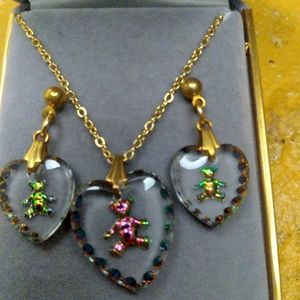 Teddy bear necklace earring set.